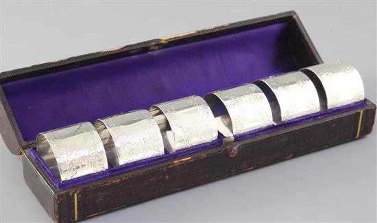 A cased matched set of six Victorian silver napkin rings,
